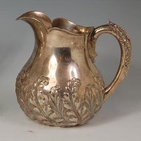 Lot 411 - A late Victorian silver milk-jug, the baluster...