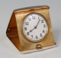 Lot 423 - A George V silver cased travel clock, with...