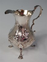 Lot 433 - A George III silver cream jug, of helmet form,...