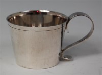 Lot 434 - An Arts & Crafts hammered silver mug, having...