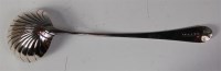 Lot 438 - A George III silver soup ladle, in the Old...