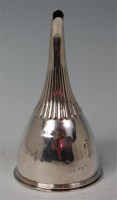 Lot 444 - A late Georgian silver wine funnel, in two...