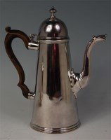 Lot 447 - A George I silver conical coffee pot, having...