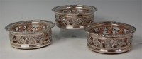 Lot 448 - A set of three late Georgian silver wine...