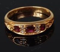 Lot 478 - An 18ct gold ruby and diamond dress ring,...