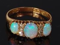 Lot 479 - A 19th century 18ct gold opal and diamond...