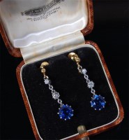 Lot 480 - A pair of 1920s synthetic sapphire and diamond...