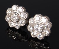 Lot 482 - A pair of 18ct white gold and diamond set ear...