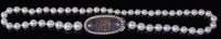 Lot 484 - A pearl and yellow metal mourning clasp choker,...