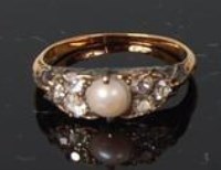 Lot 497 - A circa 1900 ladies yellow and white metal...