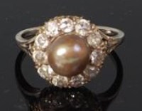 Lot 499 - A circa 1900 yellow gold pearl and diamond...