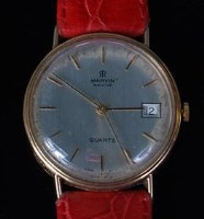 Lot 514 - A gents Marvin Revue 9ct gold cased quartz...