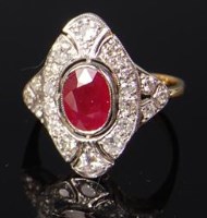 Lot 519 - An Art Deco 18ct gold ruby and diamond dress...