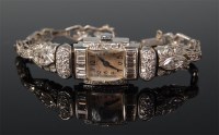 Lot 523 - A ladies Art Deco platinum and diamond set...