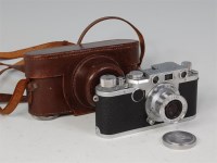 Lot 546 - A Leica IIF camera, number 573206, with Leitz...