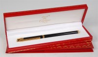 Lot 557 - A cased Must de Cartier Stylo Plume fountain...