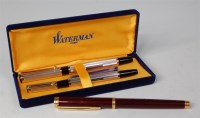 Lot 559 - A cased Waterman's two piece pen set, the...