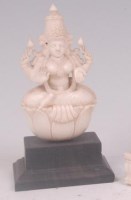 Lot 593 - An Indian carved ivory figure of Lakshmi, the...