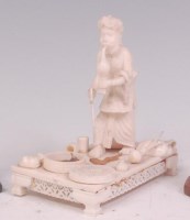 Lot 594 - A circa 1900 Indian carved ivory group 'The...