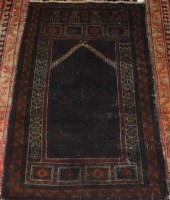 Lot 691 - A semi-antique Persian woollen prayer rug,...