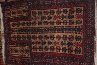 Lot 695 - A semi-antique Persian woollen prayer rug,...