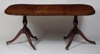 Lot 711 - An early 20th century mahogany twin pedestal...