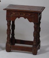 Lot 717 - An early 18th century oak joint stool, having...