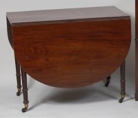 Lot 721 - A Regency mahogany round cornered dropleaf...