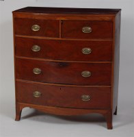 Lot 746 - A Regency mahogany bowfront chest, of two...