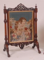 Lot 784 - A Victorian rosewood fire screen, with scroll...