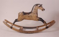 Lot 789 - A circa 1900 childs dapple-grey rocking horse,...