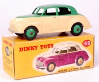 Lot 1954 - Dinky, 159 Morris Oxford saloon, green upper...