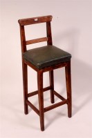 Lot 87 - A signal box clerks stool with green leather...