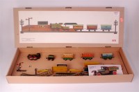 Lot 1030 - A Paya train set in the style of Bing Table...