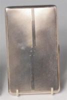 Lot 69 - An Art Deco silver pocket cigarette case, the...