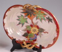 Lot 50 - A 1930s Crown Devon oval twin handled dish, of...