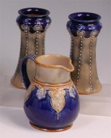 Lot 53 - A pair of Royal Doulton painted and glazed...