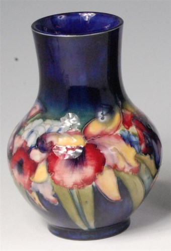 Lot 2 - An early 20th century Moorcroft painted and...