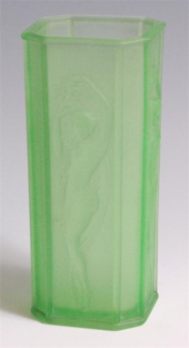 Lot 11 - A French Art Deco press moulded green glass...