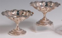 Lot 28 - A pair of Art Nouveau silver pedestal bonbon...