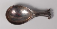 Lot 116 - An Omar Ramsden silver caddy spoon, having...