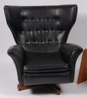 Lot 255 - A 1960s black leatherette upholstered...
