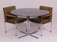 Lot 279 - A 1970s tubular chrome and smoked glass topped...