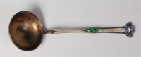 Lot 115 - An Art Nouveau Russian silver and enamel spoon,...