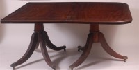 Lot 835 - A 19th century mahogany triple pillar dining...