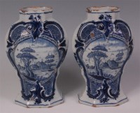 Lot 424 - A pair of late 18th century Dutch Delft vases,...