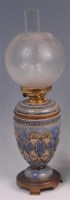 Lot 430 - A Doulton Lambeth stoneware pedestal oil lamp,...