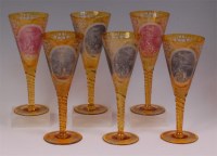 Lot 449 - A matched set of six Bohemian amber glass...