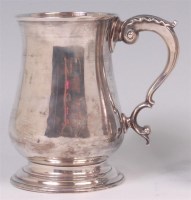 Lot 494 - An early George III silver bell shaped tankard,...