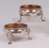 Lot 496 - A pair of early George III silver table salts,...